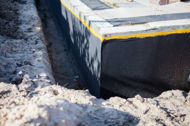 Professional Wet Basement Repair technician working in Saint Paul, MN